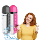 Bouteille d'eau en plastique avec pilulier