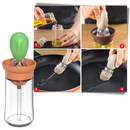 Bouteille d'huile en verre avec pinceau