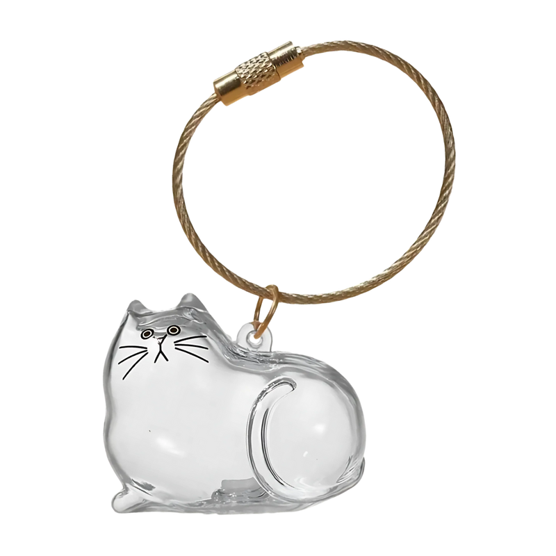 Porte-clés capsule poils de chat