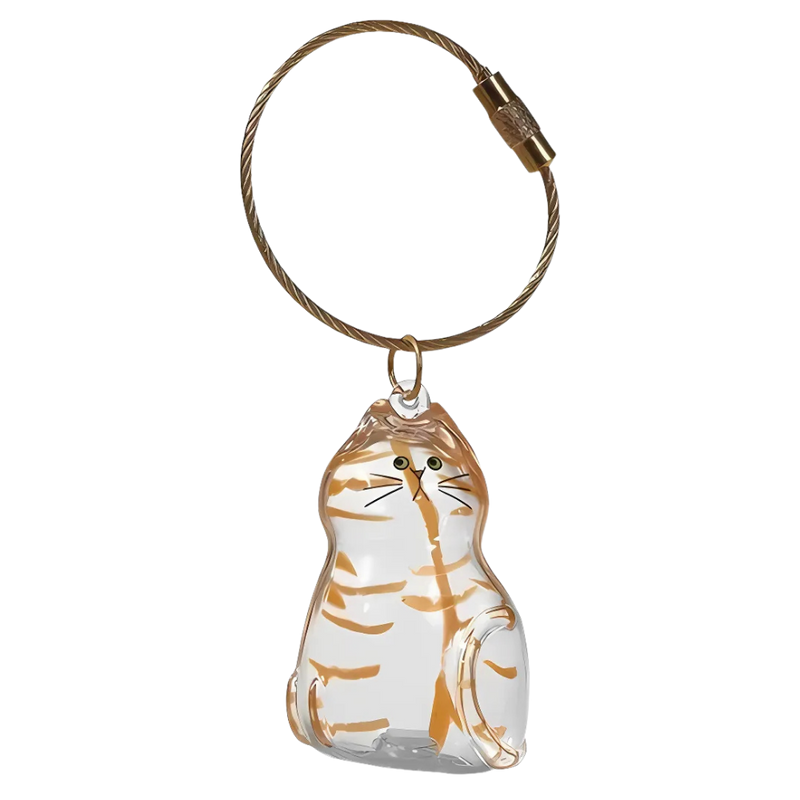 Porte-clés capsule poils de chat