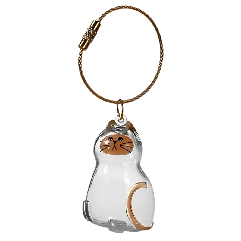 Porte-clés capsule poils de chat